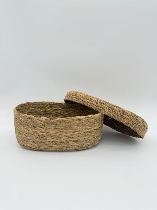 Small woven basket with lid